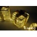Подарки под елку белый с золотыми бантами комплект
